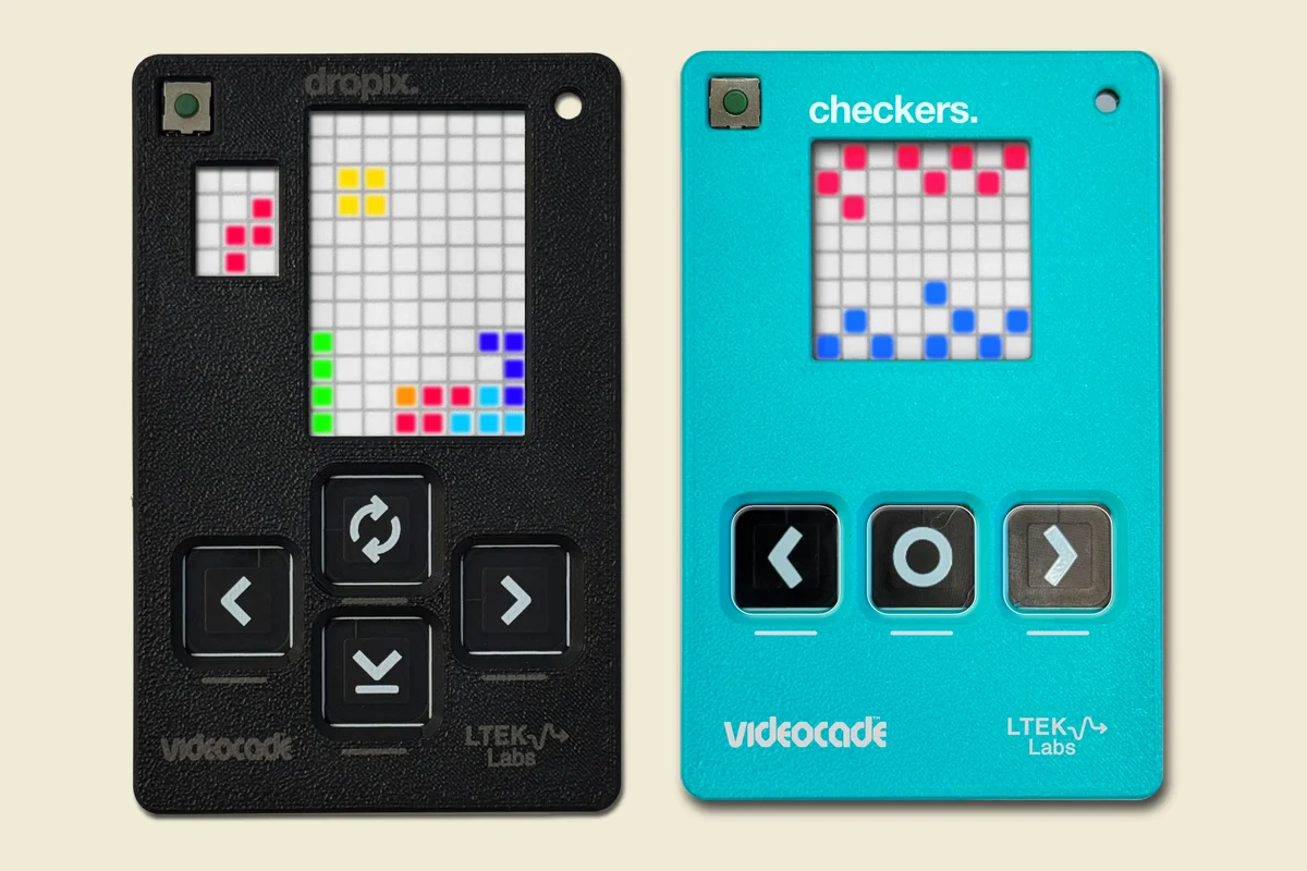 Three VIDEOCADE consoles: car race, dropix and checkers